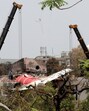 Wreckage of an Air India aircraft, bound for London's Gatwick Airport, which crashed during take-off from an airport in Ahmedabad Wreckage of an Air India aircraft, bound for London's Gatwick Airport, which crashed during take-off from an airport in Ahmedabad