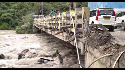 A damaged bridge after heavy rainfall in Kullu. (PTI) A damaged bridge after heavy rainfall in Kullu. (PTI)