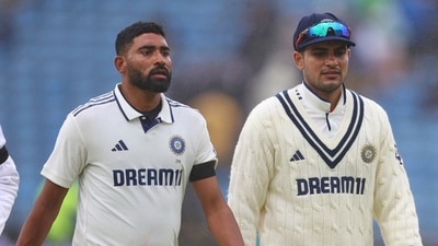 India's Mohammed Siraj, left, and captain Shubman Gill leave the field after rain stopped play on day five of the first cricket Test (AP) India's Mohammed Siraj, left, and captain Shubman Gill leave the field after rain stopped play on day five of the first cricket Test (AP)