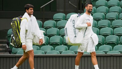 Novak Djokovic and Carlos Alcaraz had a training session together on Centre Court as they eye up adding more historic Wimbledon silverware to their tallies. (AP) Novak Djokovic and Carlos Alcaraz had a training session together on Centre Court as they eye up adding more historic Wimbledon silverware to their tallies. (AP)