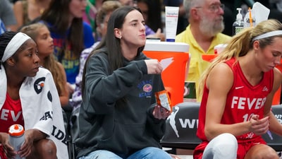 Indiana Fever guard Caitlin Clark eats Goldfish crackers during the first half of a WNBA basketball game against the Dallas Wings (AP) Indiana Fever guard Caitlin Clark eats Goldfish crackers during the first half of a WNBA basketball game against the Dallas Wings (AP)