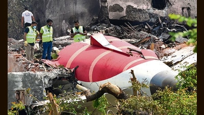 Forensic experts and DGCA officials searching for evidence at Air India Plane crash site. (HT PHOTO) Forensic experts and DGCA officials searching for evidence at Air India Plane crash site. (HT PHOTO)