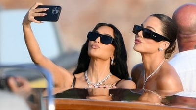 Bezos-Sanchez wedding:: US reality TV personality Kim Kardashian (L) and US socialite Khloe Kardashian snap a selfie as they arrive at San Giorgio Maggiore on the wedding day of Amazon founder Jeff Bezos with Lauren Sanchez, in Venice on June 27, 2025. (Photo by Marco BERTORELLO / AFP) (AFP) Bezos-Sanchez wedding:: US reality TV personality Kim Kardashian (L) and US socialite Khloe Kardashian snap a selfie as they arrive at San Giorgio Maggiore on the wedding day of Amazon founder Jeff Bezos with Lauren Sanchez, in Venice on June 27, 2025. (Photo by Marco BERTORELLO / AFP) (AFP)