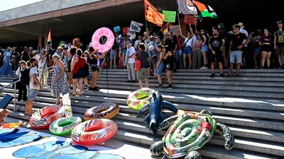 The "No Space for Bezos" protesters, who argue that the lagoon city is turning into a private playground for the wealthy at the expense of the local population due to "overtourism," have partially won their battle after threatening to flood the canals with inflatable crocodiles. (AFP) The "No Space for Bezos" protesters, who argue that the lagoon city is turning into a private playground for the wealthy at the expense of the local population due to "overtourism," have partially won their battle after threatening to flood the canals with inflatable crocodiles. (AFP)