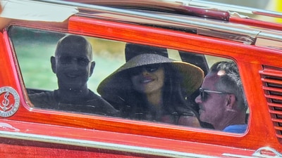 Lauren Sanchez Bezos and Jeff Bezos pictured travelling together in a car. (AP) Lauren Sanchez Bezos and Jeff Bezos pictured travelling together in a car. (AP)