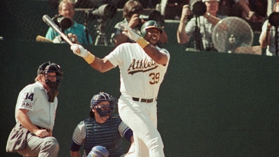 Oakland Athletics' Dave Parker (39) watches the ball fly over the right center field wall for a sixth inning solo home run in Game 2 of the American League Championship baseball series against the Toronto Blue Jays, at Oakland, Calif., Oct. 4, 1989. (AP) Oakland Athletics' Dave Parker (39) watches the ball fly over the right center field wall for a sixth inning solo home run in Game 2 of the American League Championship baseball series against the Toronto Blue Jays, at Oakland, Calif., Oct. 4, 1989. (AP)
