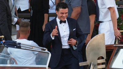 Best Dressed: Orlando Bloom looked sharp in a dark suit with a white shirt and bow tie, accessorized with an analog watch and his recently elevated free-spirited flair. REUTERS/Manuel Silvestri (REUTERS)