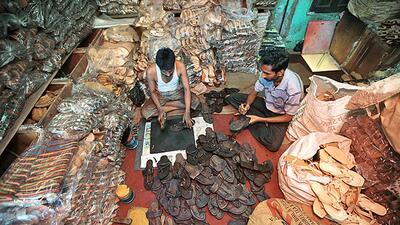 Prada has acknowledged that its Spring/Summer 2026 men’s footwear line (right) was inspired by Kolhapuri chappals, after backlash over lack of credit to the original artisans. (Ht Archives/Photo by Mahendra Parikh and Vidya Subramanian / Hindustan Times) (Hindustan Times) Prada has acknowledged that its Spring/Summer 2026 men’s footwear line (right) was inspired by Kolhapuri chappals, after backlash over lack of credit to the original artisans. (Ht Archives/Photo by Mahendra Parikh and Vidya Subramanian / Hindustan Times) (Hindustan Times)