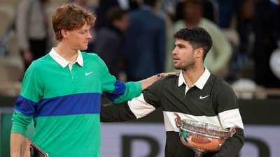 French Open; Jannik Sinner of Italy and Carlos Alcaraz of Spain pose together at the trophy presentation. (IMAGN IMAGES via Reuters Connect)