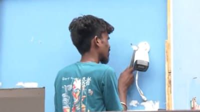 CCTV camera installation at the college building amid ongoing protests and visible police presence, with slogans being raised outside on Saturday. (ANI) CCTV camera installation at the college building amid ongoing protests and visible police presence, with slogans being raised outside on Saturday. (ANI)