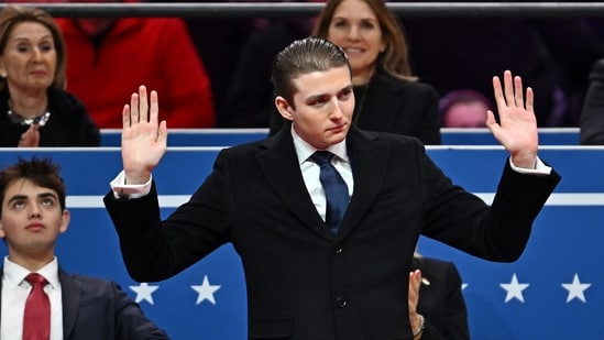 After Trump's military strike on Iran, social media users are questioning why Barron Trump isn't enlisting in the military, citing his father's past deferments. (Photo by ANGELA WEISS / AFP) (AFP)