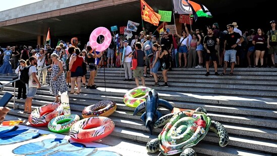 The "No Space for Bezos" protesters, who argue that the lagoon city is turning into a private playground for the wealthy at the expense of the local population due to "overtourism," have partially won their battle after threatening to flood the canals with inflatable crocodiles.(AFP)