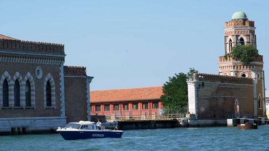 Police patrol the water in front of the Venice Arsenale in Venice, Italy, Saturday, June 28, 2025. (AP Photo/Luca Bruno)(AP)