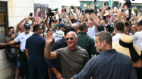 The newlyweds were seen leaving their hotel and making their way to Harry's Bar, a restaurant known for its carpaccio and Bellini. On their outing, the couple&nbsp;wore casual attire, and Jeff, 61, was beaming as he waved to the photographers while sporting sunglasses and a light brown T-shirt.(AFP)