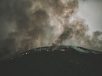 A brush fire in Coeur d’Alene was reportedly set to lure firefighters