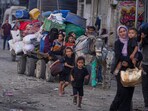 Displaced Palestinians flee Jabalia after the Israeli army issued evacuation orders in Gaza City on June 29, 2025. 