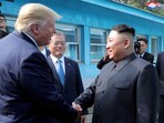 US President Donald Trump shakes hands with North Korean leader Kim Jong Un as they meet at the demilitarized zone (DMZ) separating the two Koreas, in Panmunjom, South Korea, 