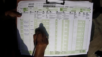 A census official collects information from a household in Guwahati in 2011. (File/AP)