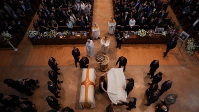 The casket of Mark Hortman, right, is covered as it sits next to the casket of Melissa Hortman before they are processed down the aisle of the sanctuary at the Basilica of St. Mary during funeral services for Mark and Melissa Hortman in Minneapolis, Minn., on Saturday, June 28, 2025. (Jeff Wheeler/Star Tribune via AP, Pool) (AP) The casket of Mark Hortman, right, is covered as it sits next to the casket of Melissa Hortman before they are processed down the aisle of the sanctuary at the Basilica of St. Mary during funeral services for Mark and Melissa Hortman in Minneapolis, Minn., on Saturday, June 28, 2025. (Jeff Wheeler/Star Tribune via AP, Pool) (AP)