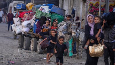 Displaced Palestinians flee Jabalia after the Israeli army issued evacuation orders in Gaza City on June 29, 2025. (AP) Displaced Palestinians flee Jabalia after the Israeli army issued evacuation orders in Gaza City on June 29, 2025. (AP)