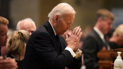 Former US President Joe Biden kneels in prayer during funeral services for Mark and Melissa Hortman at the Basilica of St. Mary in Minneapolis, Minnesota, June 28, 2025.  Alex Kormann/Pool via REUTERS (via REUTERS)