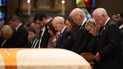 From left, Minnesota attorney general Keith Ellison, Tom Weber, Lt. Gov. Peggy Flanagan, former Minnesota Gov. Mark Dayton, former US Vice President Kamala Harris, former US President Joe Biden, Gwen Walz and Minnesota Gov. Tim Walz attend funeral services for Mark and Melissa Hortman at the Basilica of St. Mary in Minneapolis, Minn., on Saturday, June 28, 2025. (Alex Kormann/Star Tribune via AP, Pool) (AP) From left, Minnesota attorney general Keith Ellison, Tom Weber, Lt. Gov. Peggy Flanagan, former Minnesota Gov. Mark Dayton, former US Vice President Kamala Harris, former US President Joe Biden, Gwen Walz and Minnesota Gov. Tim Walz attend funeral services for Mark and Melissa Hortman at the Basilica of St. Mary in Minneapolis, Minn., on Saturday, June 28, 2025. (Alex Kormann/Star Tribune via AP, Pool) (AP)