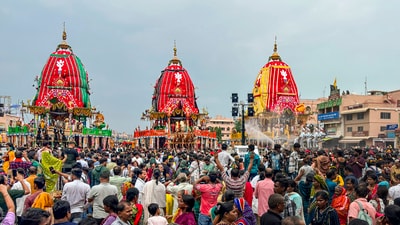 People during the annual 'Rath Yatra' festival celebration, in Puri, Odisha. (PTI) People during the annual 'Rath Yatra' festival celebration, in Puri, Odisha. (PTI)
