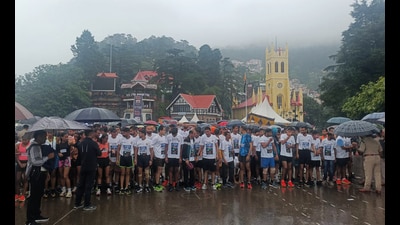 People during the 12th Half Marathon organised by the Himachal Pradesh Police Department on The Ridge in Shimla on Sunday. (ANI) People during the 12th Half Marathon organised by the Himachal Pradesh Police Department on The Ridge in Shimla on Sunday. (ANI)