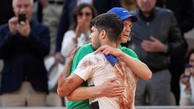 Carlos Alcaraz of Spain and Jannik Sinner of Italy after the men’s singles final match on day 15 at Roland Garros Stadium (IMAGN IMAGES via Reuters Connect)