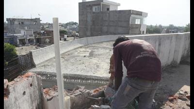 The building which became a major hurdle for the overbridge being demolished. (HT Photo)
