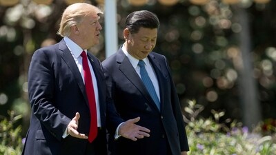 US President Donald Trump (L) and Chinese President Xi Jinping (R) walk together at the Mar-a-Lago estate in Palm Beach, Florida. (AFP) US President Donald Trump (L) and Chinese President Xi Jinping (R) walk together at the Mar-a-Lago estate in Palm Beach, Florida. (AFP)