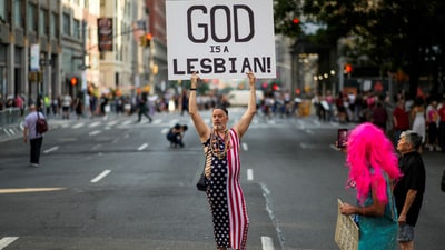 A person holds up a sign as people take part in the NYC Dyke March during New York’s Pride week LGBTQ+ celebration in New York City, U.S., June 28, 2025.  REUTERS/Eduardo Munoz (REUTERS)