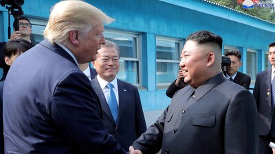 US President Donald Trump shakes hands with North Korean leader Kim Jong Un as they meet at the demilitarized zone (DMZ) separating the two Koreas, in Panmunjom, South Korea, (Reuters)