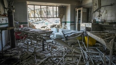 Rescuers search through the rubble of a damaged section of Evin Prison following an Israeli strike. (AP) Rescuers search through the rubble of a damaged section of Evin Prison following an Israeli strike. (AP)