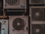 The mechanic was repairing an air conditioning unit on the 8th floor of Agrawal Cyber Plaza. The mechanic was repairing an air conditioning unit on the 8th floor of Agrawal Cyber Plaza.