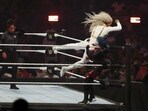 US wrestler Jade Cargill (L) fights against Japanese wrestler Asuka for the undisputed WWE Championship Queen of the Ring at Kingdom Arena in Riyadh on June 28, 2025.(Fayez Nureldine / AFP)