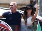 Jeff Bezos and Lauren Sanchez shared a heartfelt moment as she expressed her love before a kiss. REUTERS/Guglielmo Mangiapane