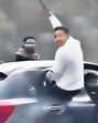 The 15-second clip video purportedly shows stunts being performed on moving cars, with an unidentified man hanging out of a car window, waving a stick, while the driver’s door remains open. (HT Photos) The 15-second clip video purportedly shows stunts being performed on moving cars, with an unidentified man hanging out of a car window, waving a stick, while the driver’s door remains open. (HT Photos)