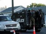 An armored police vehicle leaves an area where multiple firefighters were attacked when responding to a fire in the Canfield Mountain area outside Coeur d’Alene, Idaho, U.S. June 29, 2025.  REUTERS/Young Kwak
