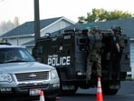 An armored police vehicle leaves an area where multiple firefighters were attacked when responding to a fire in the Canfield Mountain area outside Coeur d’Alene, Idaho, U.S. June 29, 2025.  
