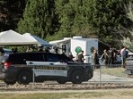 Law enforcement officers gather at Cherry Hill Park after multiple firefighters were attacked when responding to a fire in the Canfield Mountain area outside Coeur d’Alene, Idaho, U.S. June 29, 2025.  