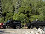 Armored law enforcement vehicles are seen at Cherry Hill Park after multiple firefighters were attacked when responding to a fire in the Canfield Mountain area outside Coeur d'Alene, Idaho, U.S. June 29, 2025. 