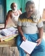 Voters pose with enumeration forms in Bihar’s Patna. (Santosh Kumar/ HT Photo)