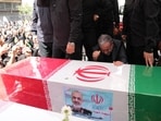 This handout picture provided by the Iranian foreign ministry shows Iran's Foreign Minister Abbas Araghchi mourning next to the coffin of Iranian Revolutionary Guards commander Hossein Salami, who was killed during Israeli strikes. This handout picture provided by the Iranian foreign ministry shows Iran's Foreign Minister Abbas Araghchi mourning next to the coffin of Iranian Revolutionary Guards commander Hossein Salami, who was killed during Israeli strikes.