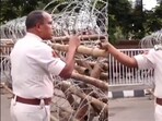 In the viral video, the cop can be heard asking police personnel to "break the legs" of protestors who came near the barbed barricade outside the CM's house. In the viral video, the cop can be heard asking police personnel to "break the legs" of protestors who came near the barbed barricade outside the CM's house.