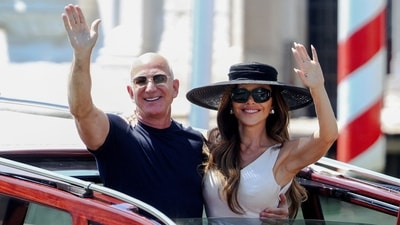 Jeff Bezos and Lauren Sanchez (Photo: REUTERS/Guglielmo Mangiapane ) Jeff Bezos and Lauren Sanchez (Photo: REUTERS/Guglielmo Mangiapane )