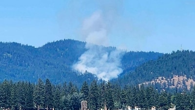 The gunman, Wess Roley, intentionally sparked a brush fire on Canfield Mountain near Coeur d’Alene on Sunday evening to lure in emergency responders, then ambushed them with gunfire. AP/PTI(AP06_30_2025_000005A) (AP) The gunman, Wess Roley, intentionally sparked a brush fire on Canfield Mountain near Coeur d’Alene on Sunday evening to lure in emergency responders, then ambushed them with gunfire. AP/PTI(AP06_30_2025_000005A) (AP)