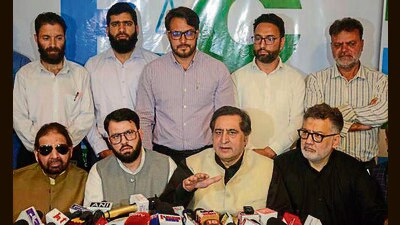JKPC chief Sajad Lone along with PDF president Hakeem Mohammad Yaseen, Jamaat-e-Islami-backed JDF’s chief Shamim Ahmad Thokar during a press conference in Srinagar on Monday. (PTI) JKPC chief Sajad Lone along with PDF president Hakeem Mohammad Yaseen, Jamaat-e-Islami-backed JDF’s chief Shamim Ahmad Thokar during a press conference in Srinagar on Monday. (PTI)