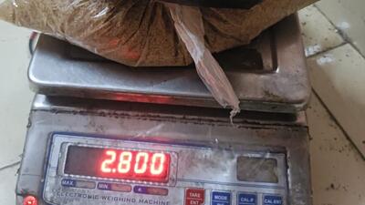 Raw material put on weighing scale to get accurate weight while making MD Raw material put on weighing scale to get accurate weight while making MD