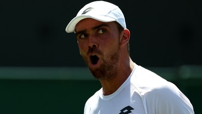 France's Benjamin Bonzi reacts during his first round match. (REUTERS)